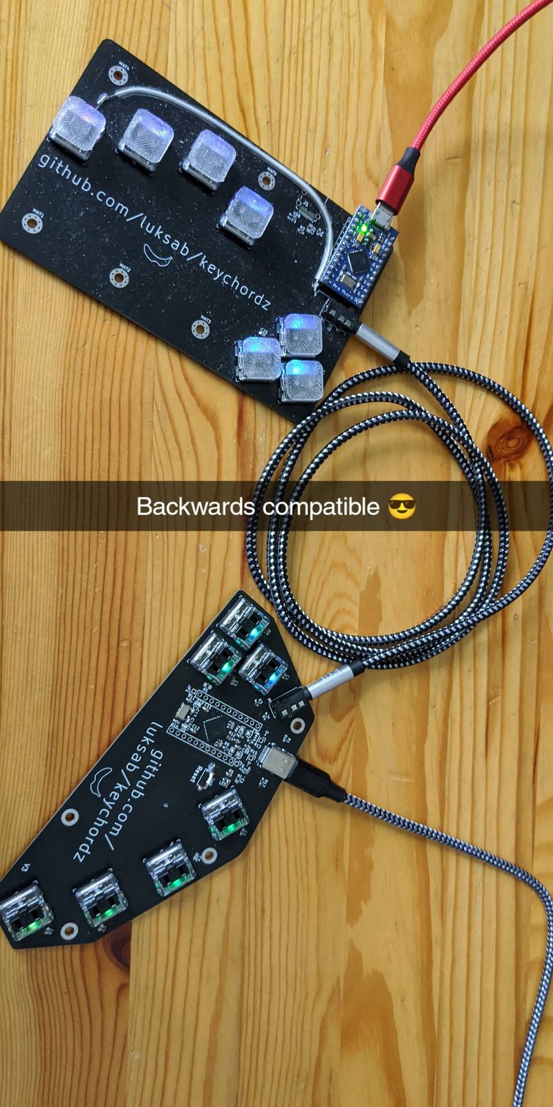 Both halves connected with coiled cable - backwards compatible