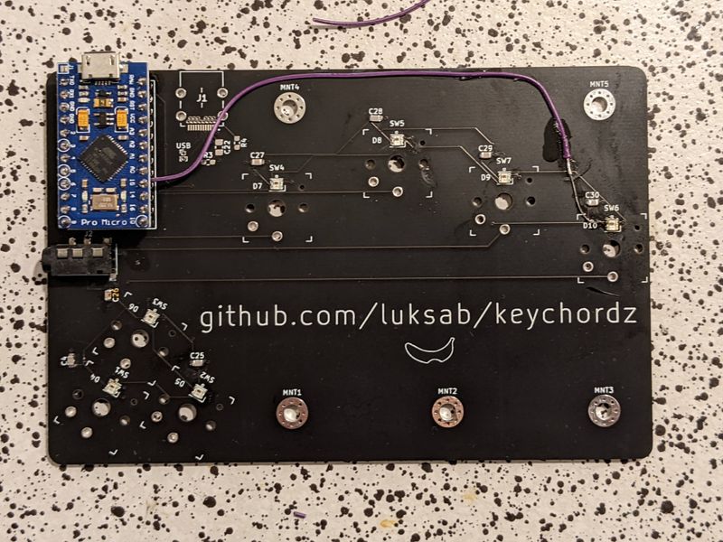 9MS rectangular PCB back with microcontroller and switch matrix